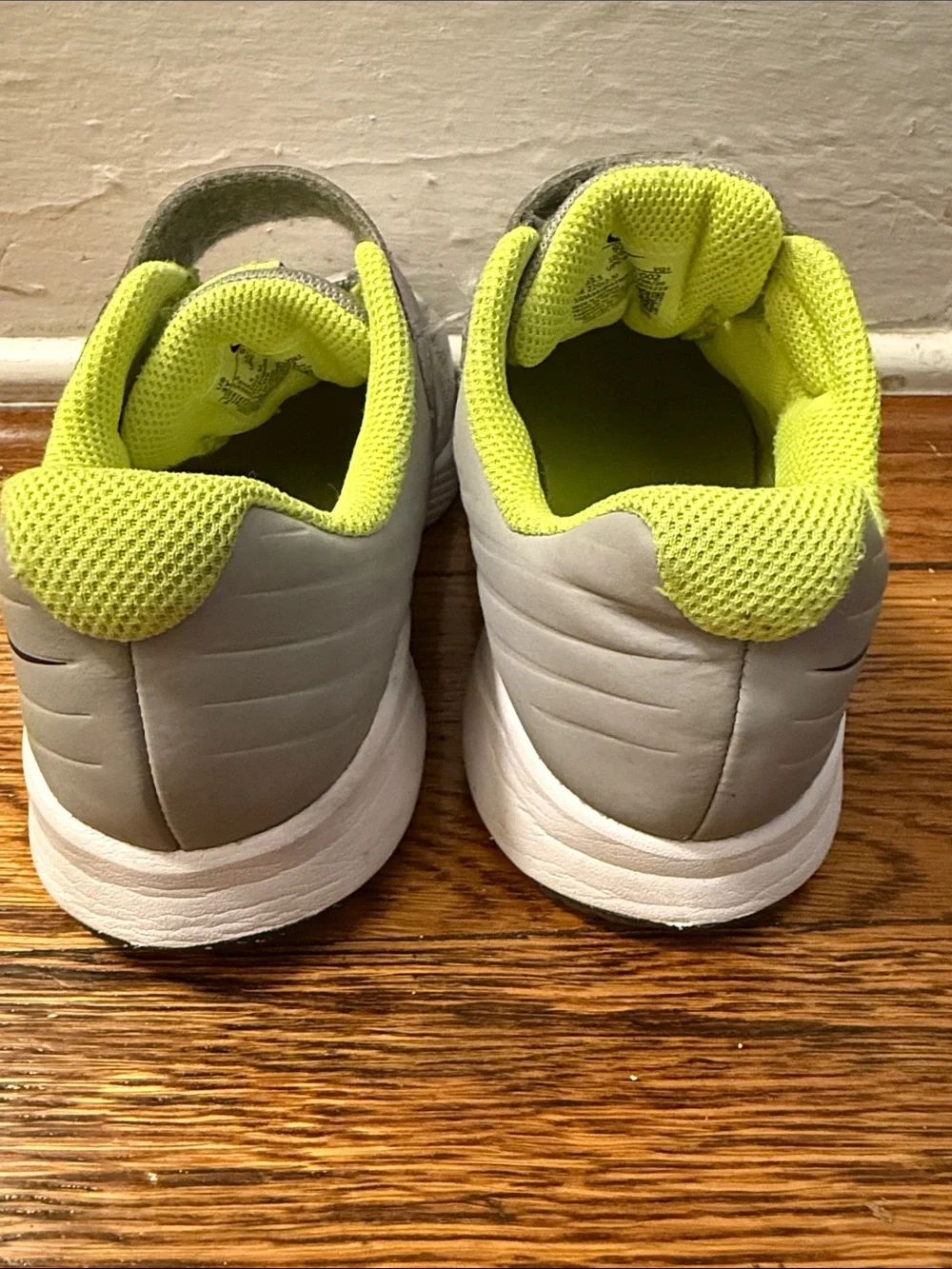 Nike Kids Light Gray Sneakers with Neon Yellow Lining